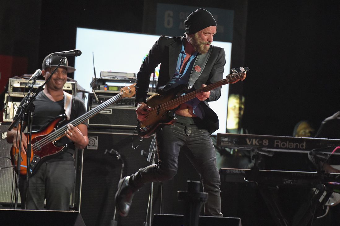 Sting performs with Common